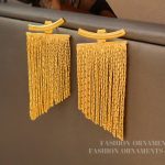 European and American high-end smile tassel earrings light luxury niche trendy earrings